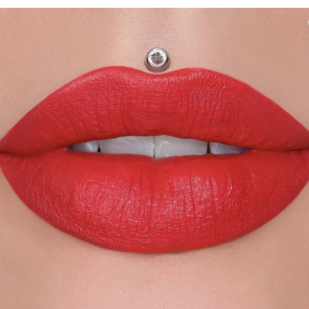 JEFFREE STAR NEWBOX CHERRY SODA 
Bold Red Lipstick Satin Finish